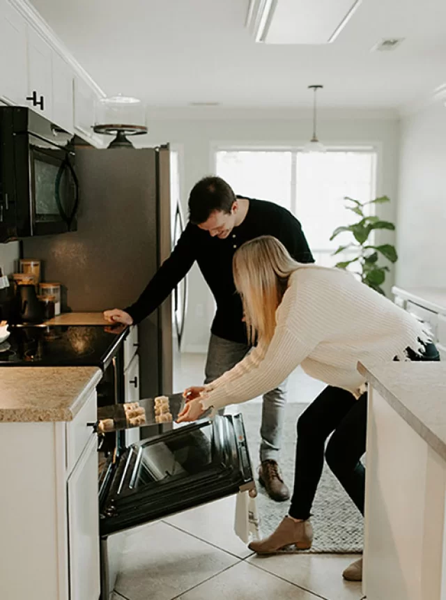 couple using their oven